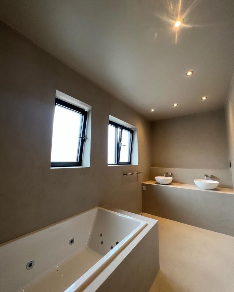 Monolithic Mastery: Sandy Grey Bathroom Elegance